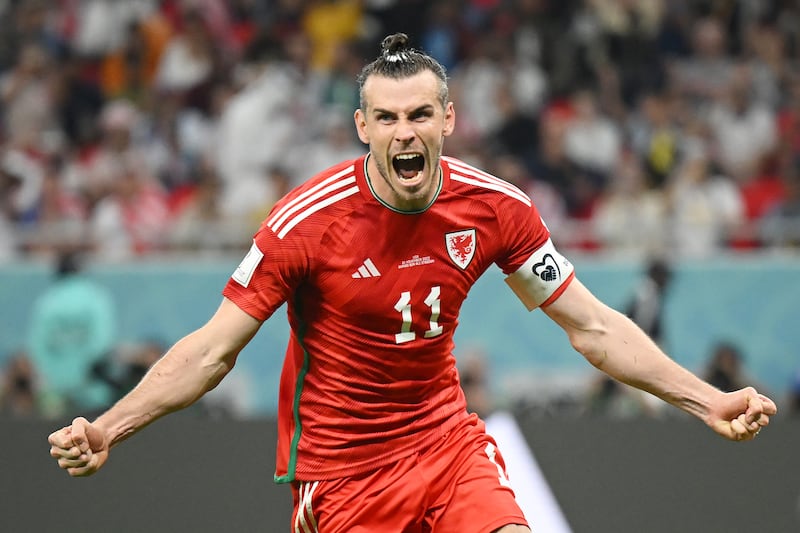Wales star Gareth Bale celebrates after levelling from the penalty spot in the 1-1 Group B draw with the USA at Ahmad Bin Ali Stadium on November 21, 2022 in Doha, Qatar. Getty