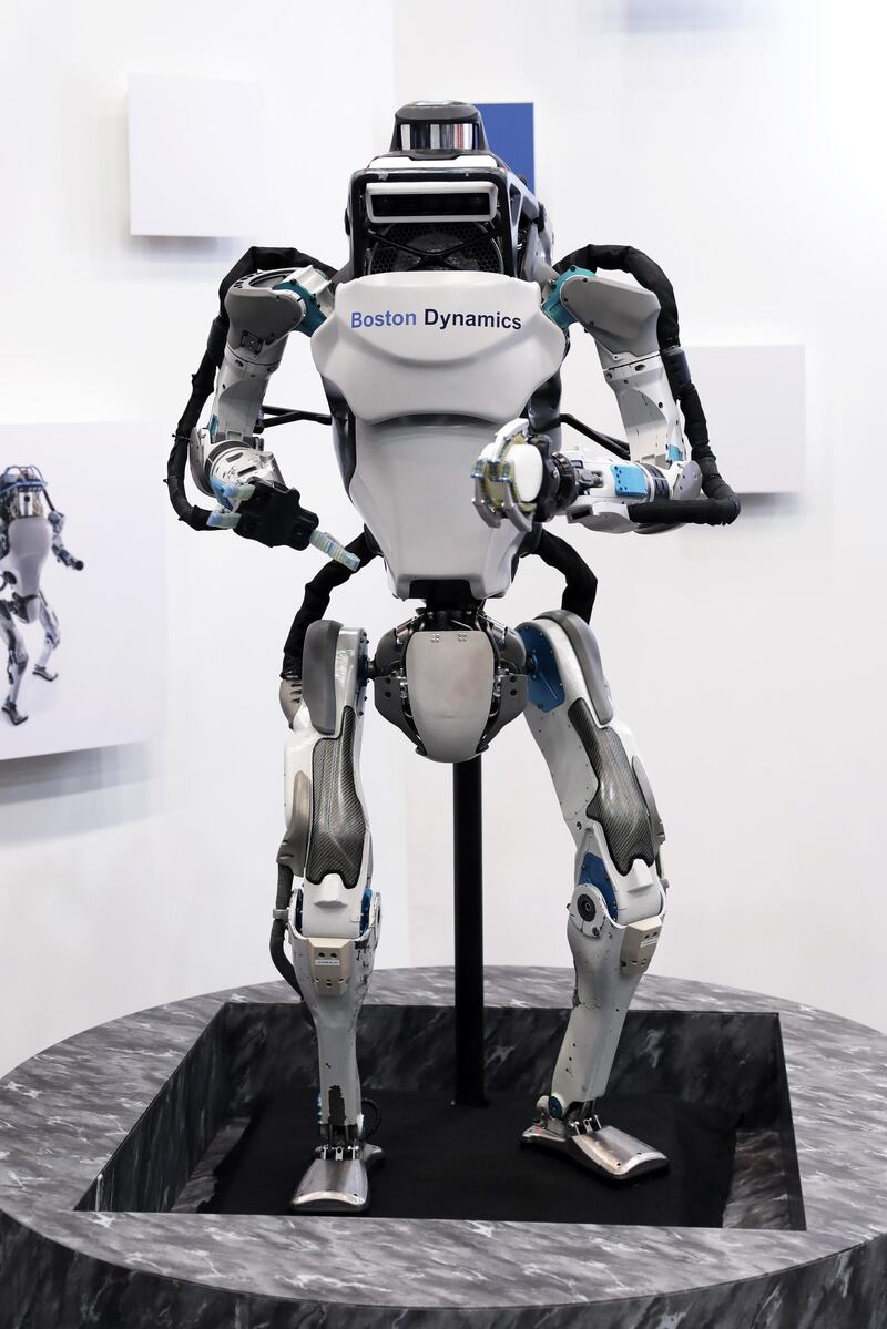 A Boston Dynamics Inc. Atlas humanoid robot is displayed at the SoftBank Robot World 2017 in Tokyo, Japan, on Tuesday, Nov. 21, 2017. SoftBank Chief Executive Officer Masayoshi Son has put money into robots, artificial intelligence, microchips and satellites, sketching a vision of the future where a trillion devices are connected to the internet and technology is integrated into humans.  Photographer: Kiyoshi Ota/Bloomberg