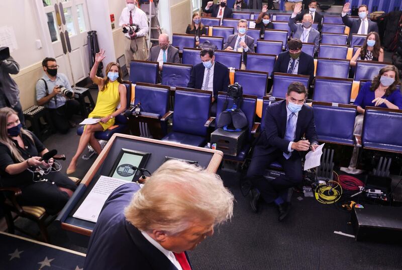 US President Donald Trump leaves a Covid-19 pandemic briefing in the Brady Press Briefing Room of the White House. Reuters