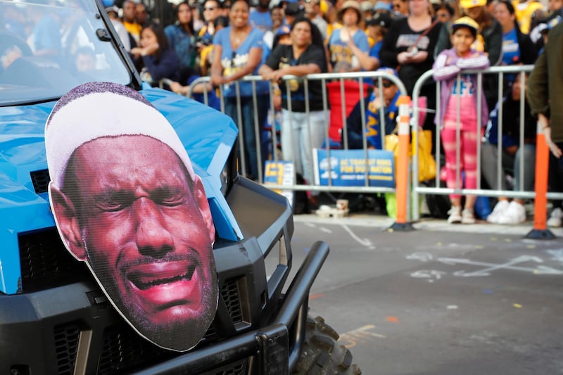 A LeBron James cut-out on the hood of a vehicle during the Golden State Warriors Championship Parade. James' Cleveland Cavaliers were defeated 4-0 in the NBA Finals by the Warriors. John G. Mabanglo / EPA