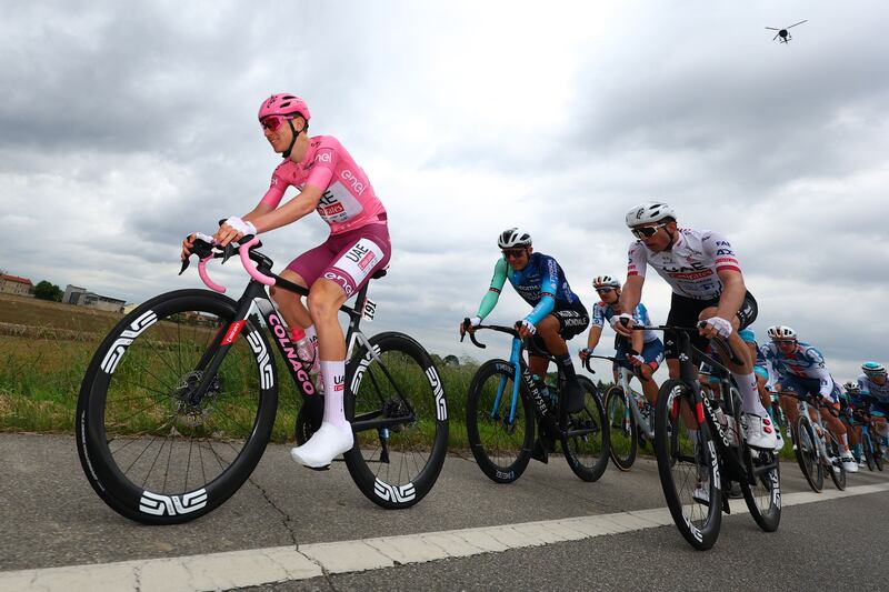 Slovenian rider Tadej Pogacar wearing the leader's pink jersey. AFP