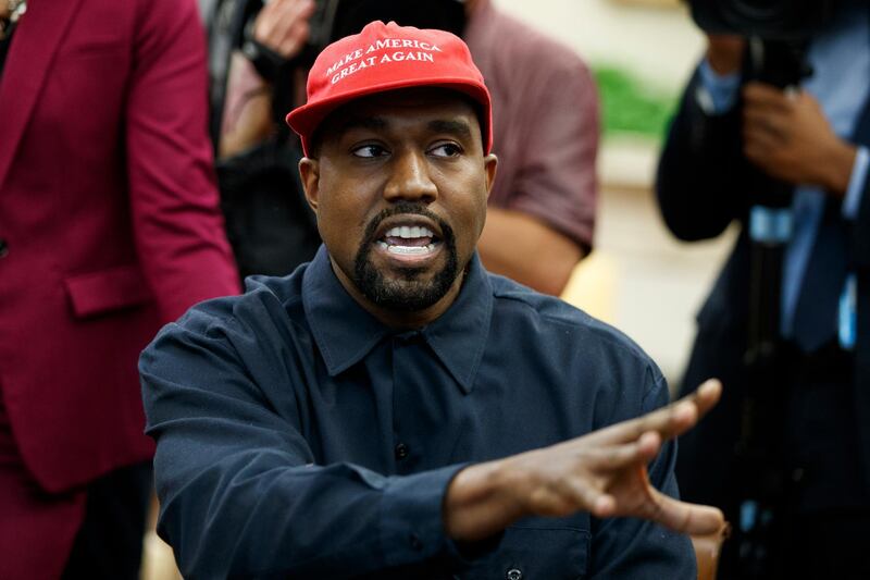 FILE - In this Oct. 11, 2018, file photo, Rapper Kanye West speaks during a meeting in the Oval Office of the White House with President Donald Trump, in Washington. Cardi B, Pharrell, Kanye West were among the celebrities who fanned out across Miami for a week of glamorous parties toasting the worldâ€™s best artists during Art Basel. The prestigious extension of the annual contemporary art fair in Basel, Switzerland, officially opened Thursday, Dec. 6.(AP Photo/Evan Vucci, File)