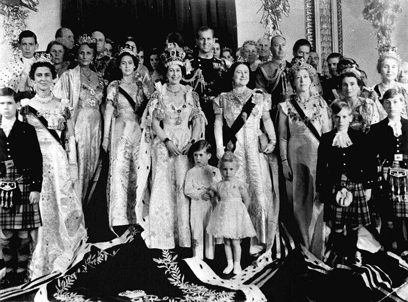 Queen Elizabeth and Prince Philip with son Prince Charles and daughter Princess Anne, other members of the royal family and guests at Buckingham Palace on return from the coronation ceremony at Westminster Abbey. 