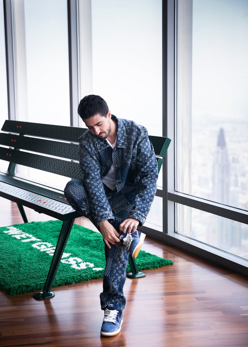 DUBAI, UNITED ARAB EMIRATES. 11 AUGUST 2020. 
Mohamed Al Safar, Bahrainin sneaker collector in his penthouse in Burj Khalifa
(Photo: Reem Mohammed/The National)

Reporter:
Section: