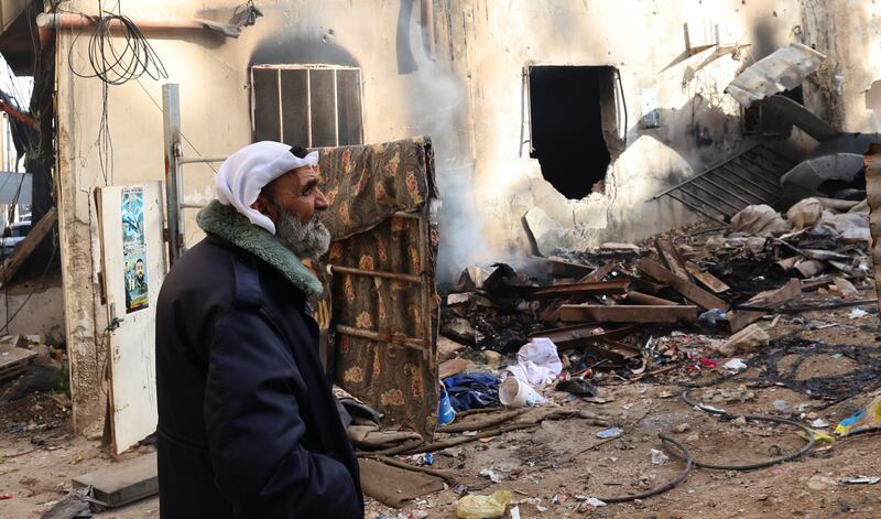 A Palestinian inspects the damage after an Israeli raid on the Jenin refugee camp in the occupied West Bank city. EPA