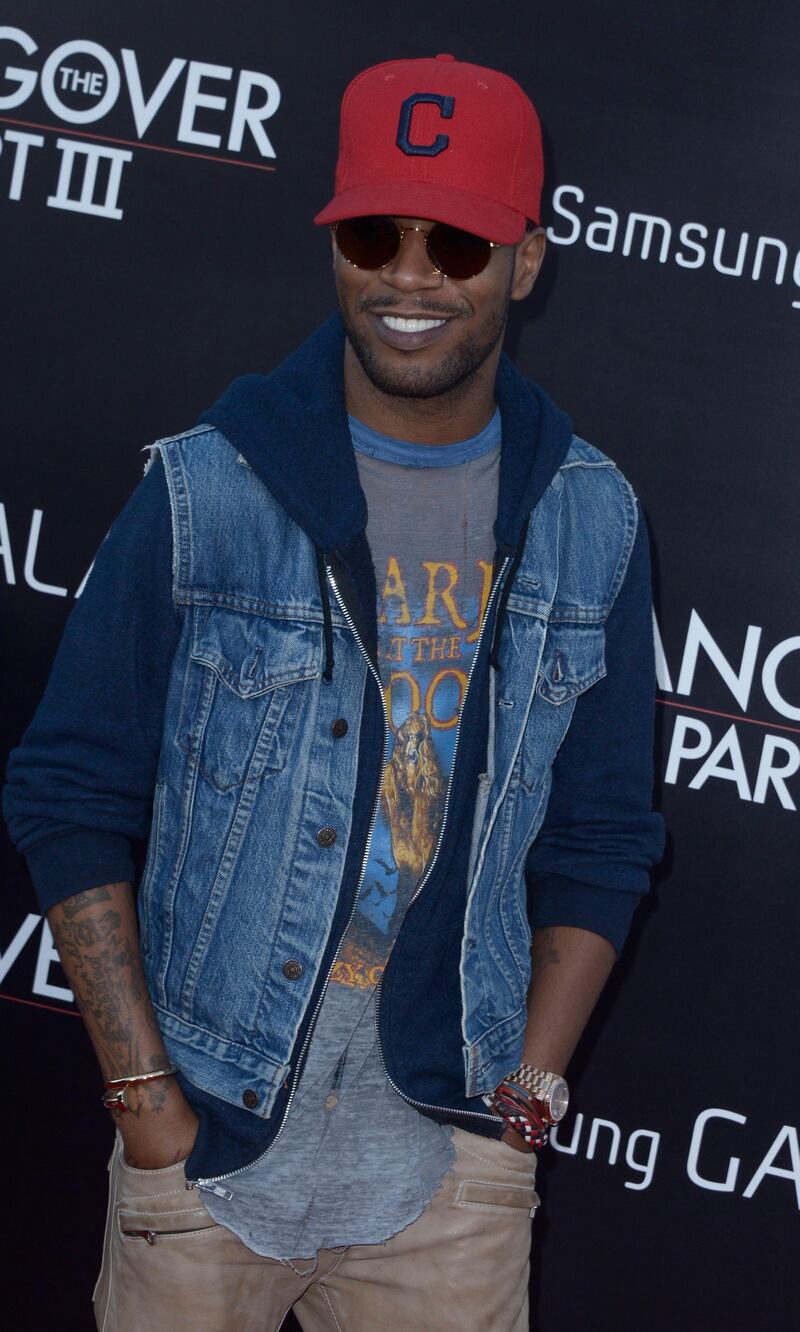epa03709517 US recording artist Kid Cudi arrives for the premiere of 'The Hangover Part III' at the Westwood Village Theatre in Los Angeles, California, USA, 20 May 2013.  EPA/PAUL BUCK *** Local Caption ***  03709517.jpg