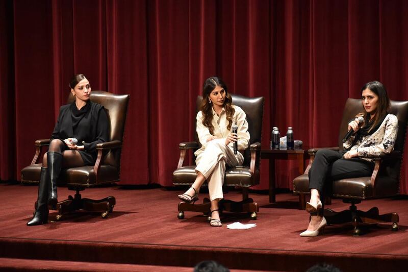 Ms Bayat, right, speaks at the Unsilenced: A Call to Action event in Los Angeles. Photo: Dan Druhora