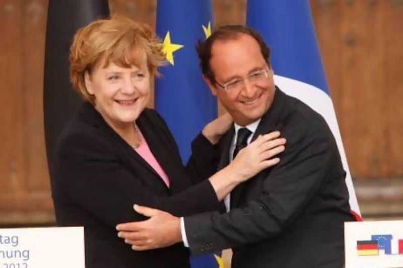 German chancellor Angela Merkel and French president Francois Hollande attend a ceremony to celebrate 50 years of French and German reconciliation in Reims, France.