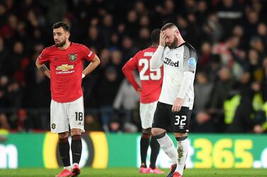 DERBY, ENGLAND - MARCH 05: Wayne Rooney of Derby County reacts after Manchester United score their second goal during the FA Cup Fifth Round match between Derby County and Manchester United at Pride Park on March 05, 2020 in Derby, England. (Photo by Michael Regan/Getty Images)