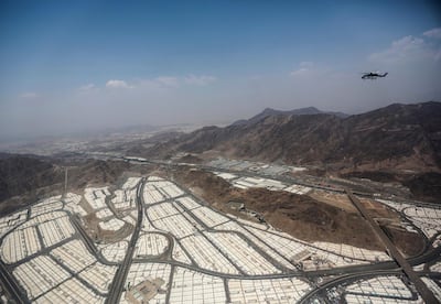 FILE - In this Sept. 25 2015 file photo, tents for pilgrims attending the annual hajj pilgrimage are seen from a helicopter over Mina, Saudi Arabia. On the second day of the hajj, after spending the night in the massive valley of Mina, the pilgrims head to Mount Arafat, some 20 kilometers (12 miles) east of Mecca, for the pinnacle of the pilgrimage. (AP Photo/Mosa'ab Elshamy, File)
