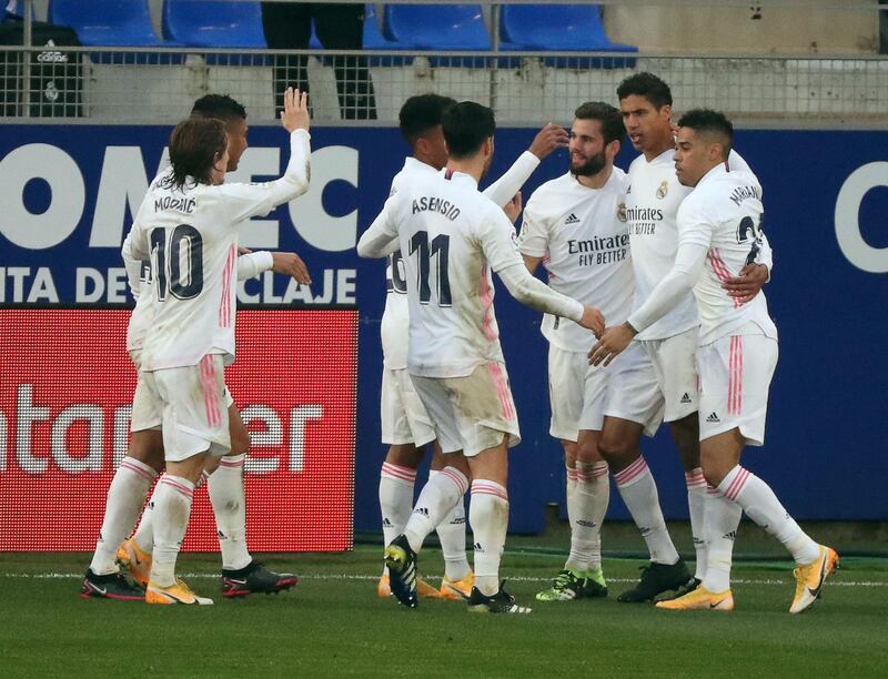 Real Madrid's Raphael Varane celebrates after scoring the equaliser. EPA