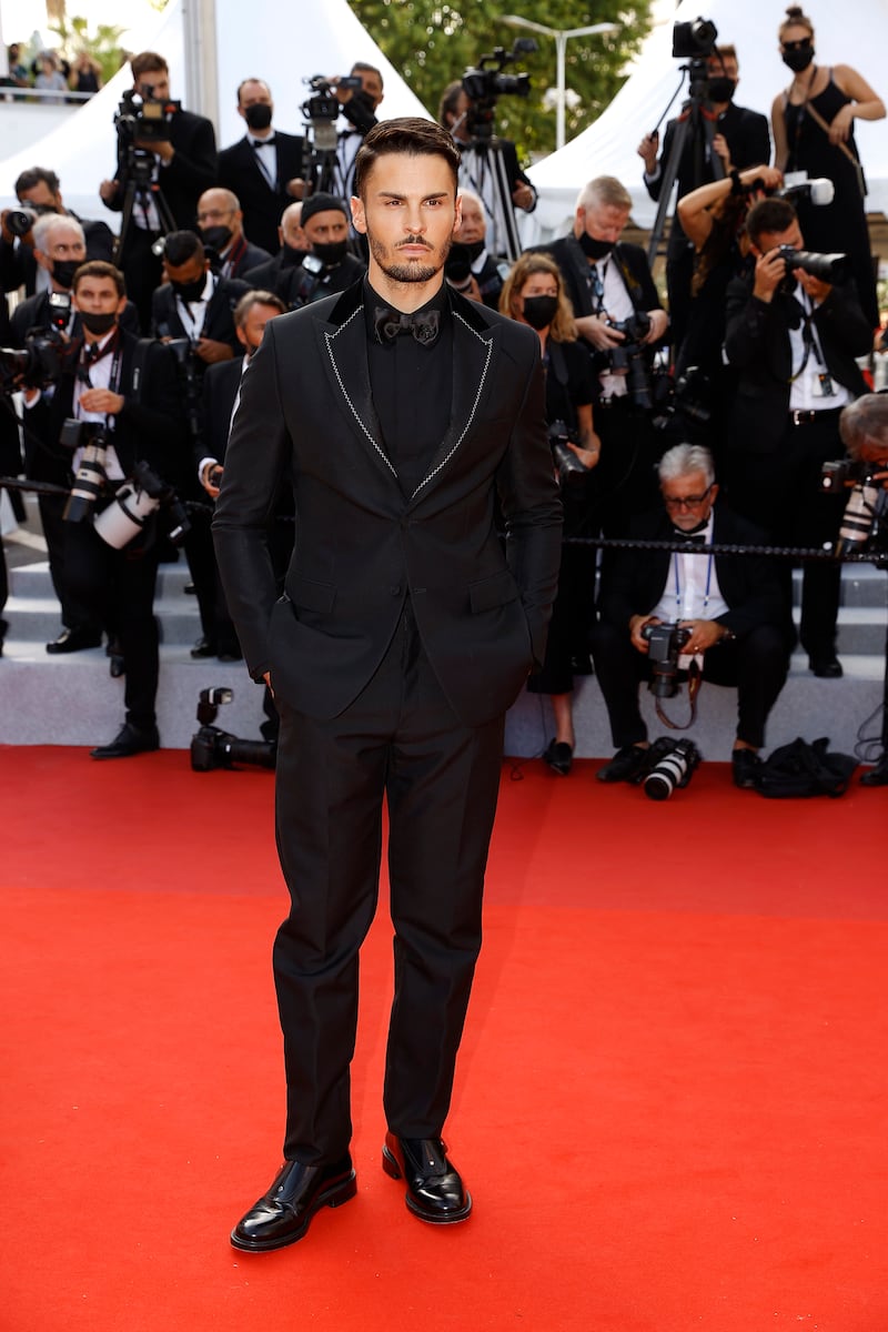 Baptiste Giabiconi attends the 'Annette' screening and opening ceremony of the 74th annual Cannes Film Festival on July 6, 2021 in Cannes, France.