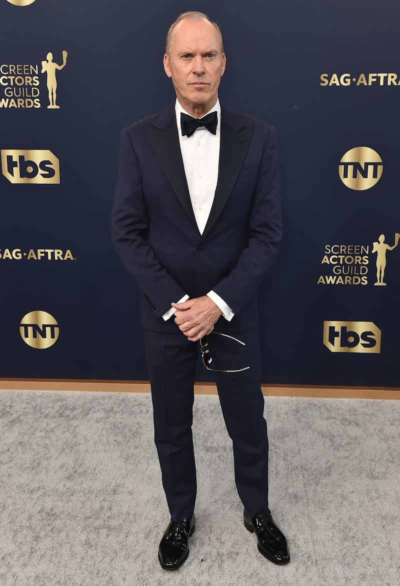 Michael Keaton arrives in a classic tux. AP
