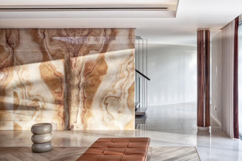 At one end of the drawing room there is a three-tonne onyx wall. Courtesy Savills