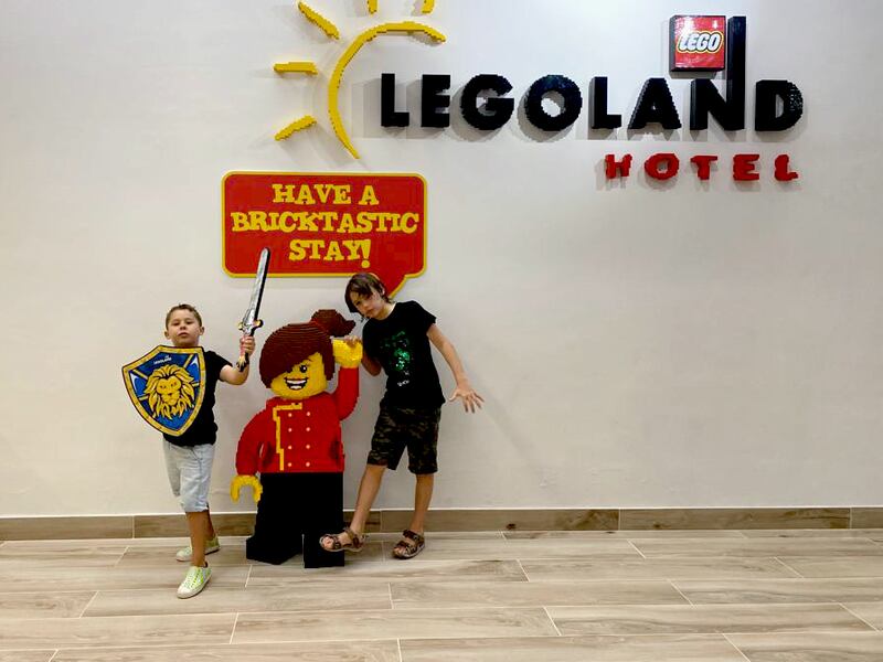 Junior reviewers Aaron, left, and brother Aden check in at Legoland Hotel Dubai.