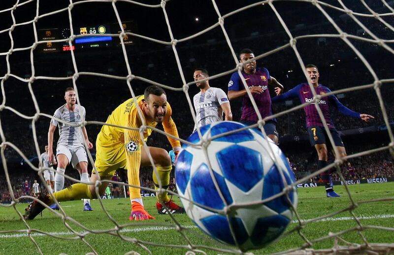 Rafinha scores to give Barcelona the lead against Inter Milan. Reuters