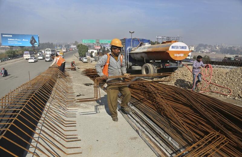 India’s plan to develop inter-city passages should improve investment opportunities in the country, it said. Channi Anand / AP Photo