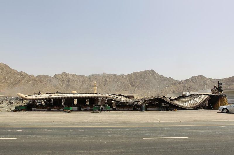 Some sections of the Friday Market shops were reduced to rubble after Saturday’s fire. Jeffrey E Biteng / The National