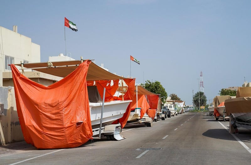 Abu Dhabi, United Arab Emirates, June 27, 2019.   Mirfa (west of ad)  to find out what people think about ghadan.  --  A typical Mirfa neighborhood with boats parked outside their homes.
Victor Besa/The National
Section:  NA
Reporter:Anna Zacharias