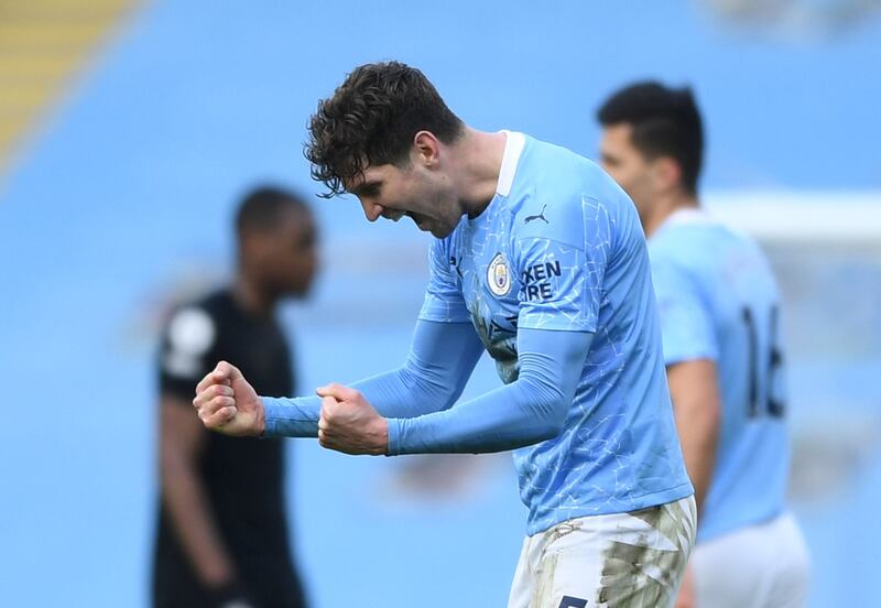 Soccer Football - Premier League - Manchester City v West Ham United - Etihad Stadium, Manchester, Britain - February 27, 2021 Manchester City's John Stones celebrates after the match Pool via REUTERS/Gareth Copley EDITORIAL USE ONLY. No use with unauthorized audio, video, data, fixture lists, club/league logos or 'live' services. Online in-match use limited to 75 images, no video emulation. No use in betting, games or single club /league/player publications.  Please contact your account representative for further details.