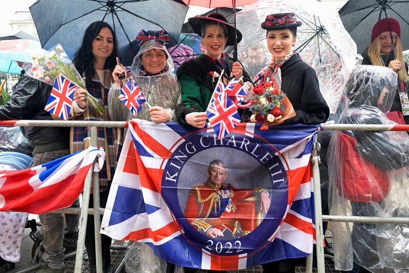 Members of the public wait King Charles to visit the town hall, in Hamburg. Reuters