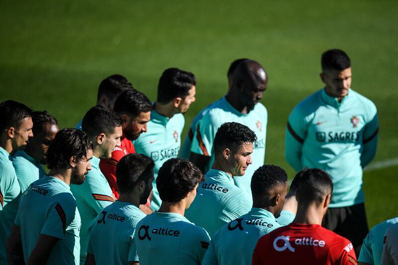 Cristiano Ronaldo, centre and teammates at the Cidade do Futebol training camp in Oeiras. AFP