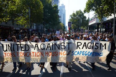 epa07441377 Demonstrators take part in an anti-racist and anti-fascist rally against Islamophobia in Melbourne, Australia, 16 March 2019. At least 49 people were killed by a gunman, believed to be Brenton Harrison Tarrant, and 20 more injured and in critical condition during the terrorist attacks against two mosques in New Zealand during Friday prayers on 15 March.  EPA/ERIK ANDERSON AUSTRALIA AND NEW ZEALAND OUT