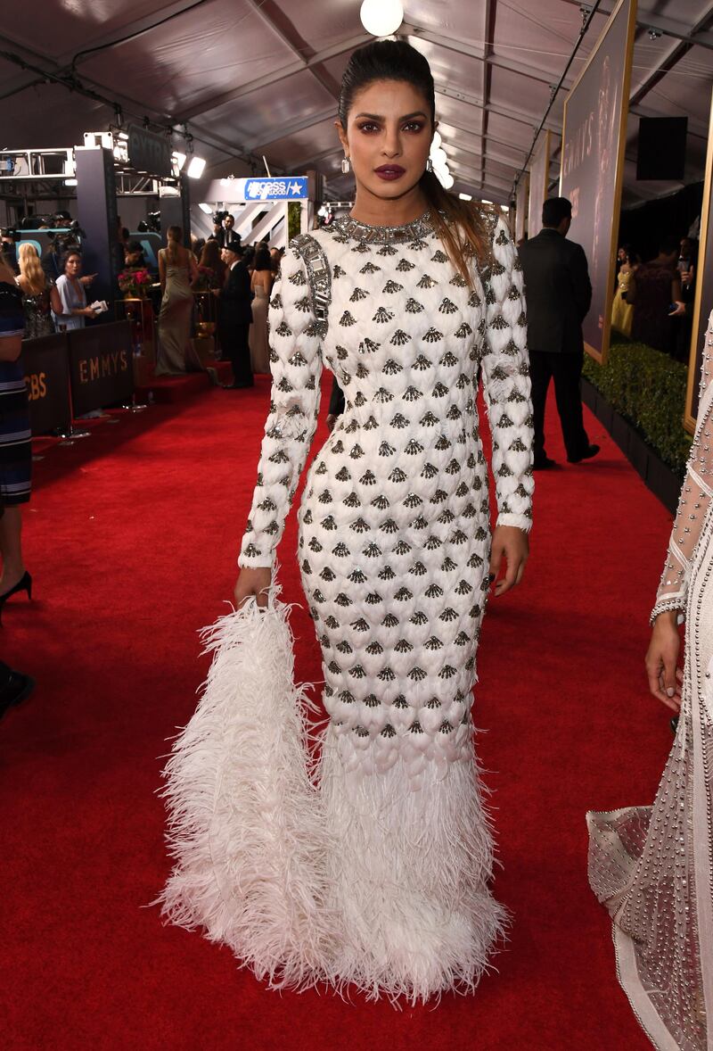 Priyanka Chopra's decadent white and silver dress was a Balmain creation. Charles Sykes/Invision/AP