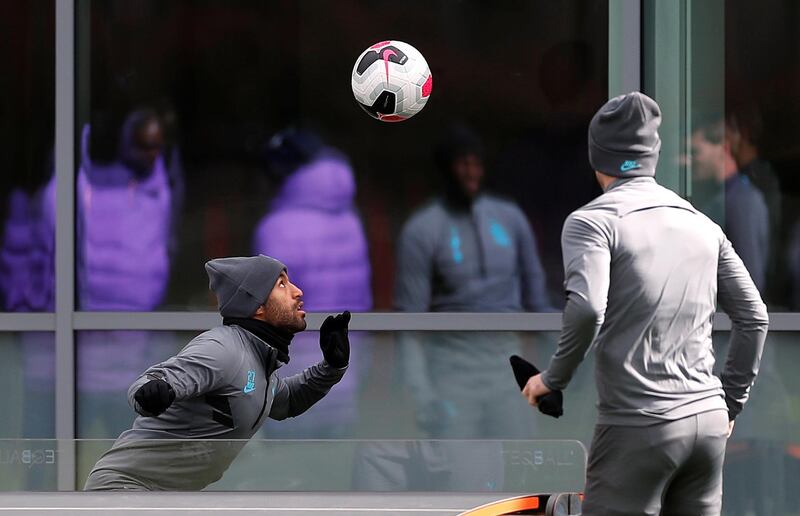 Tottenham Hotspur's Lucas Moura and Giovani Lo Celso play head tennis. Reuters