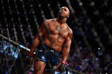 France's Ciryl Gane celebrates his victory on Australia's Tai Tuivasa in their men's heavyweight fight during the Ultimate Fighting Championship (UFC) event at the Accor Arena in Paris, on September 3, 2022.  (Photo by JULIEN DE ROSA  /  AFP)