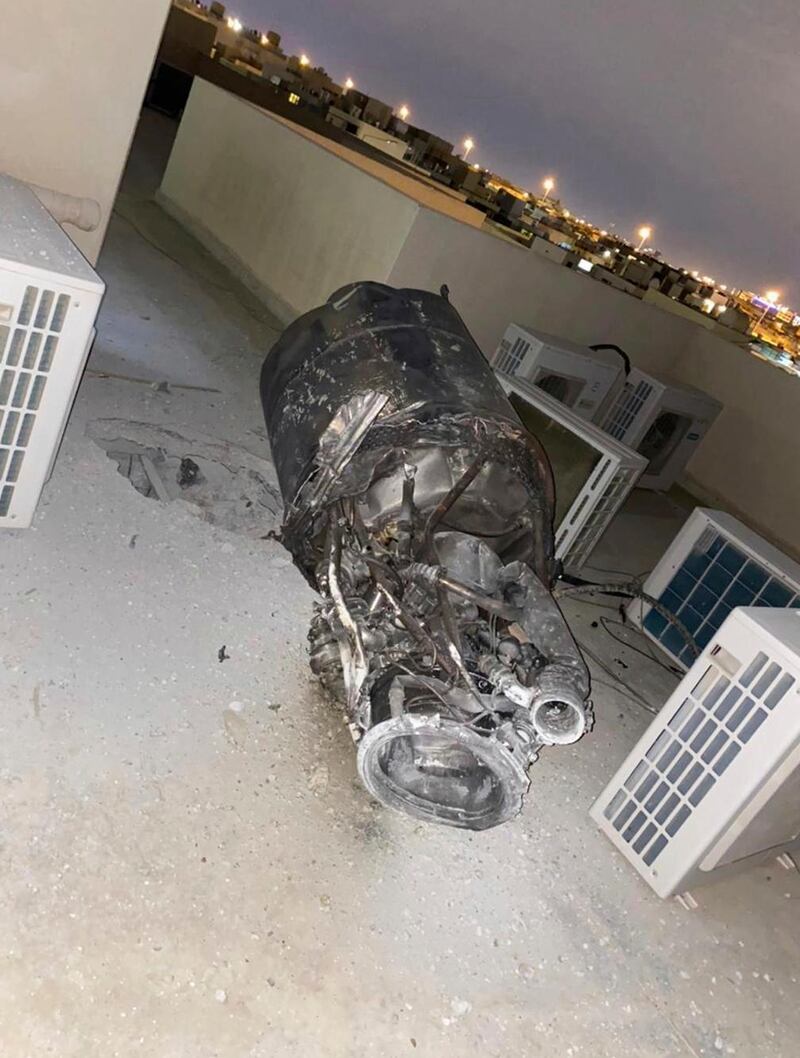 The remnants of a missile fired by Yemen's Houthi rebels, on a house rooftop in Saudi Arabia's capital Riyadh. SPA via AP