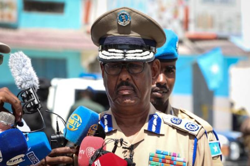 Somali Police Commissioner Gen Abdi Hassan Hijar announces the end of the siege. AFP