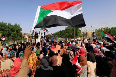 Sudanese civilians celebrate in Khartoum after protest leaders and the ruling military council reached an agreement to share power on July 5, 2019. Reuters