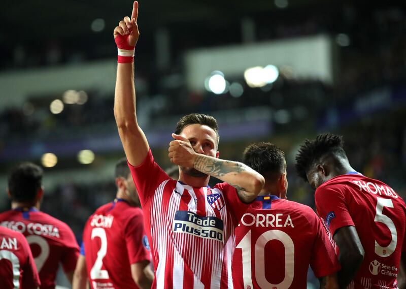 Saul Niguez of Atletico celebrates after scoring his sides third goal. Getty