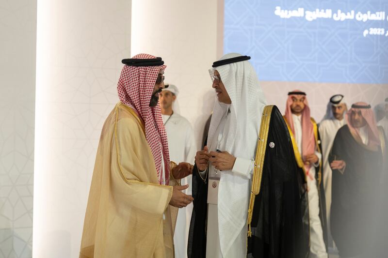 Sheikh Tahnoun bin Zayed, UAE National Security Adviser and Deputy Ruler of Abu Dhabi, speaks to Prince Abdulaziz bin Salman, Saudi Arabia's Minister of Energy. Abdulla Al Neyadi / Presidential Court