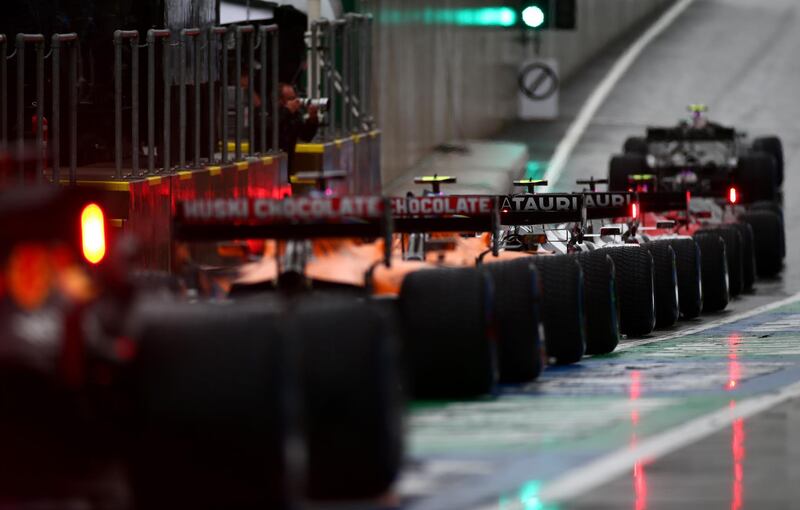 Cars line-up in the pit lane for qualifying at the Styrian Grand Prix at the Red Bull Ring in Spielberg on July 11. Getty