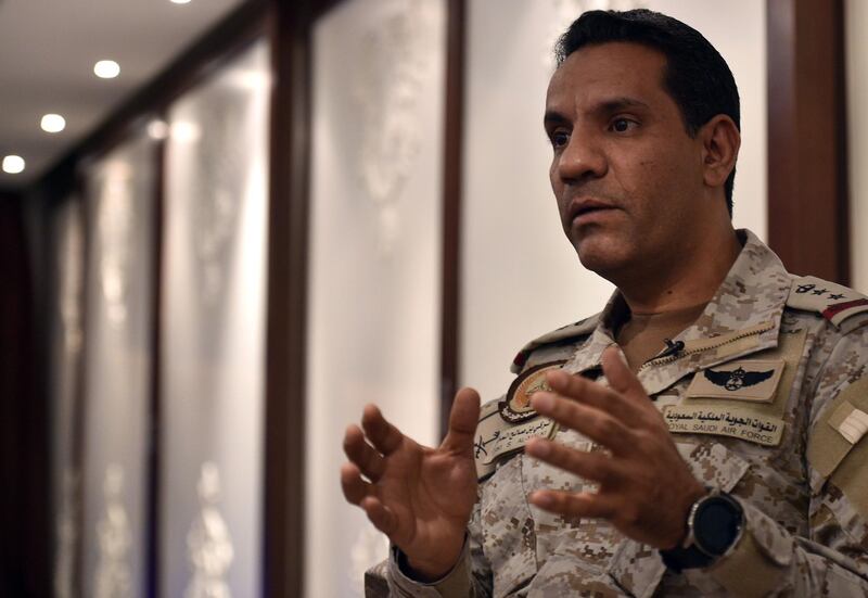 Spokesman of the Saudi-led military coalition Colonel Turki Al-Maliki talks during an interview with AFP in the capital Riyadh, on May 21, 2019. Coalition spokesman Colonel Turki al-Maliki said two missiles were shot down between Jeddah and Taiz districts of Mecca province but did not elaborate on the suspected target or who fired them. / AFP / FAYEZ NURELDINE
