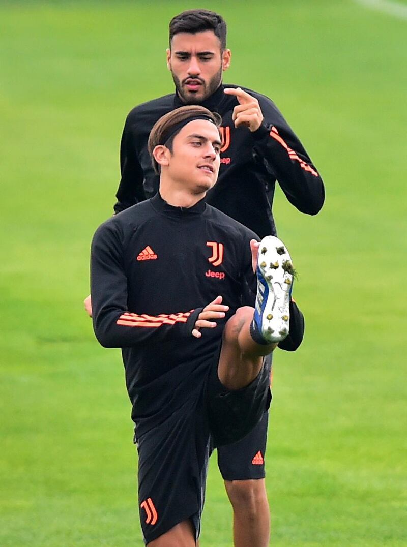 Juventus' Paulo Dybala and Gianluca Frabotta. Reuters