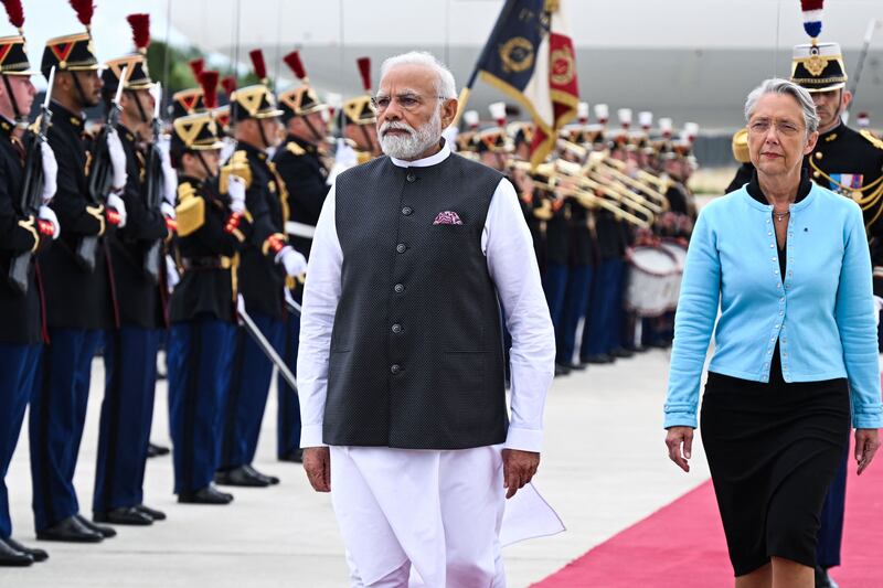 Mr Modi and Ms Borne at the start of his a two-day visit to France. AFP