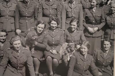 The queen with fellow Auxiliary Territorial Service members in a photo in 'Crown And Conflict - Portraits of a Queen in Wartime'. Victoria Pertusa / The National