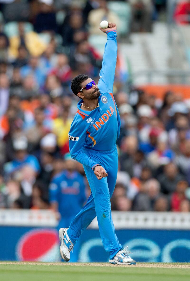 India's Ravindra Jadeja pitches a delivery during the ICC Champions Trophy group B cricket match between India and West Indies at The Oval cricket ground in London, Tuesday, June 11, 2013.  (AP Photo/Matt Dunham) *** Local Caption ***  Britain ICC Trophy India West Indies.JPEG-0c8a5.jpg