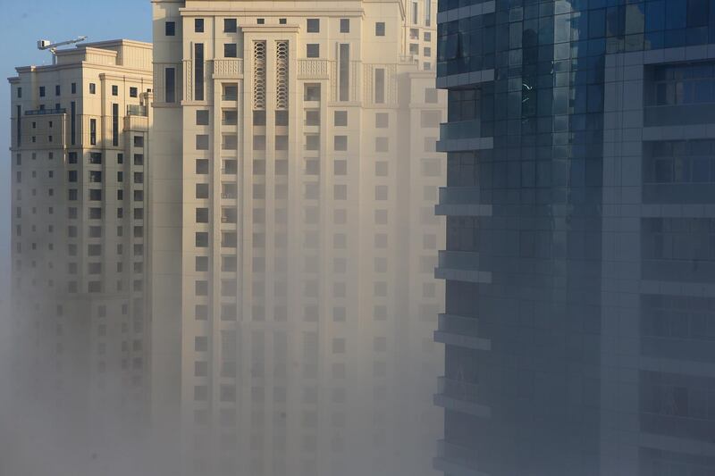 DUBAI, UAE. January 8, 2015 - Morning fog sweeps over Dubai Marina, January 8, 2015. (Photos by: Sarah Dea/The National, Story by: Standalone, News)
 *** Local Caption ***  SDEA080115-fog09.JPG