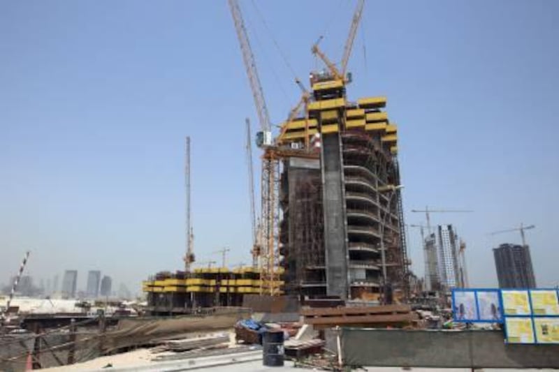 ABU DHABI - 20JUL2011 - Workers have stopped working past two days for not getting their salaries for two months at Tameer Tower construction site on Reem Island named Al Rajhi  properties in Abu Dhabi. Ravindranath K / The National
