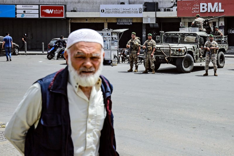 Security forces stand guard at Nur Square on the southern entrance of the northern Lebanese port city Tripoli. AFP