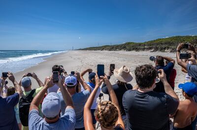 People observe from the Playa Linda beach in Florida. EPA