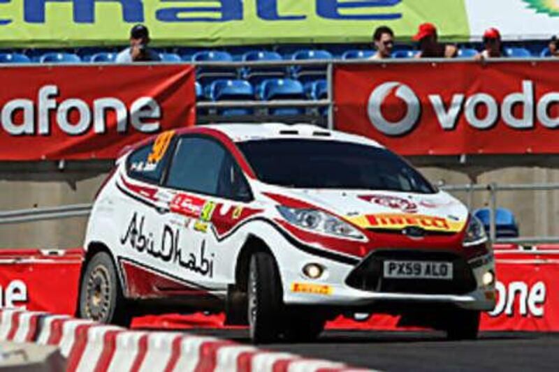 Bader al Jabri, of Team Abu Dhabi, negotiates the Portugal de Rally circuit.