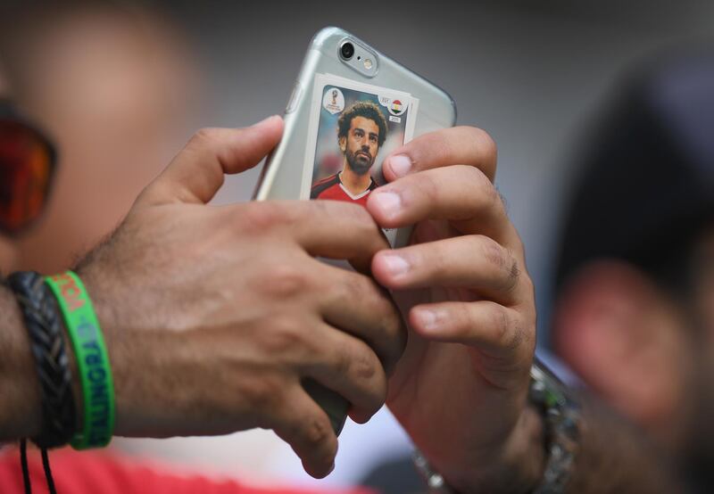 An Egypt fan with a sticker of Mohamed Salah of Egypt on their phone, before the game against Saudi Arabia. Getty