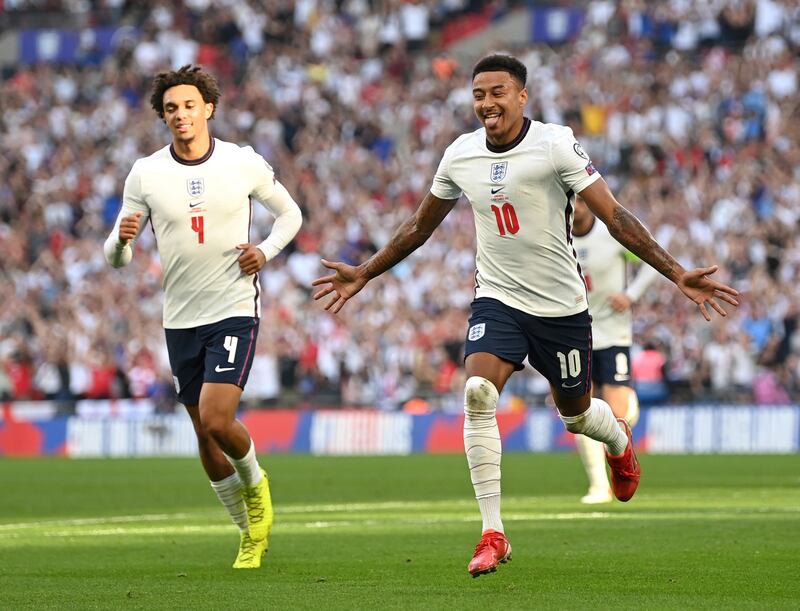 Jesse Lingard of England  celebrates after opening the scoring. Getty