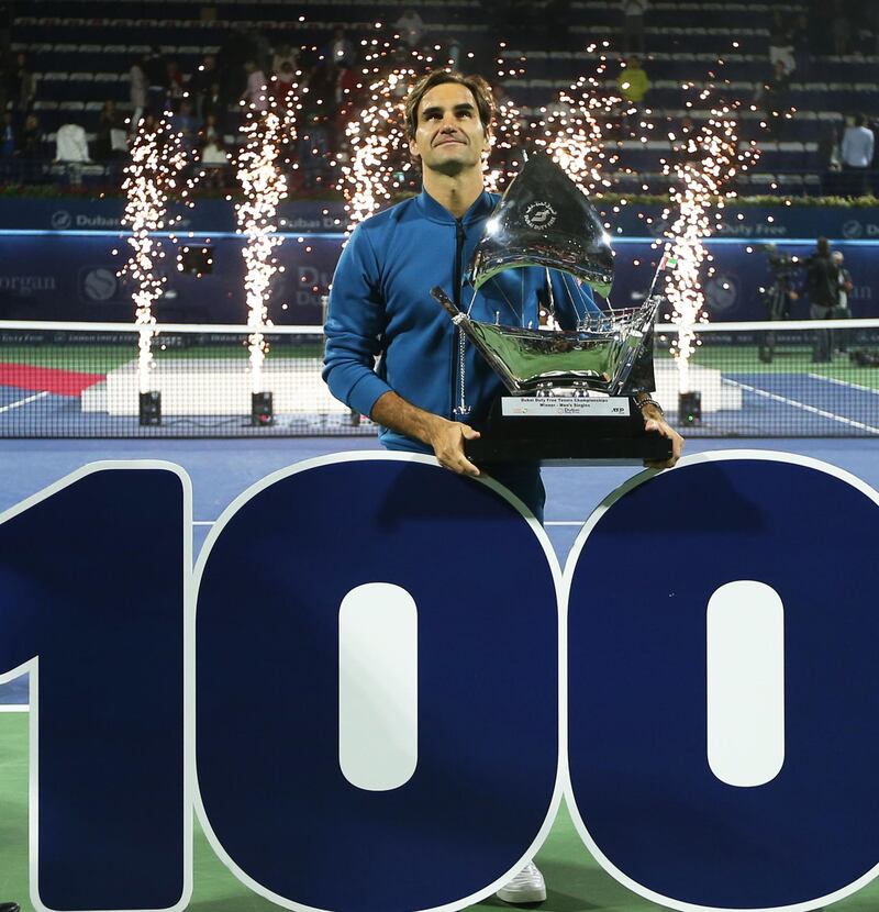 epa07408993 Roger Federer of Switzerland poses with his trophy after defeating Stefanos Tsitsipas of Greece in their final match at the Dubai Duty Free Tennis ATP Championships 2019 in Dubai, United Arab Emirates, 02 March 2019.  EPA/ALI HAIDER