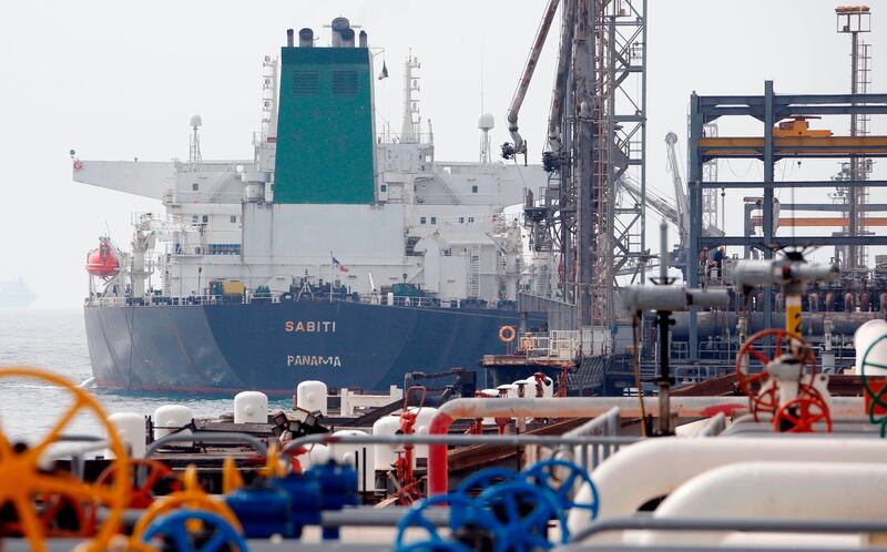 (FILES) This file photo taken on March 12, 2017  shows an Panamanian tanker docking at the platform of the oil facility in the Khark Island, on the shore of the Gulf. The United States warned June 26, 2018 that countries around the world must stop buying Iranian oil before November 4 or face a renewed round of American economic sanctions. A senior State Department official warned foreign capitals "we're not granting waivers" and described tightening the noose on Tehran as "one of our top national security priorities."
 / AFP / ATTA KENARE
